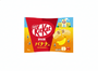 Japanese Kit Kat: Banana (9 pcs) features banana-flavored chocolate and comes in a vibrant yellow and blue package with Japanese text, banana slices, and cartoon people. thumbnail 1