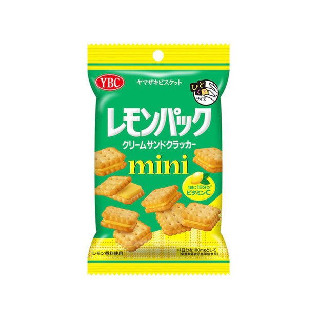 A green and yellow package of cream sandwich crackers with Japanese text, included in the Holiday Treat Extravaganza Christmas Crate (15 pcs)—perfect for festive snack boxes.