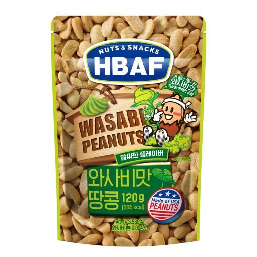 A 120g package of HBAF Korean Style Peanuts: Wasabi, featuring a cartoon peanut character, nutritional information, and a label stating "Made of USA Peanuts." The bag is adorned with vibrant green and yellow colors, wasabi imagery, and contains Korean-style peanuts coated in an irresistible wasabi flavor.