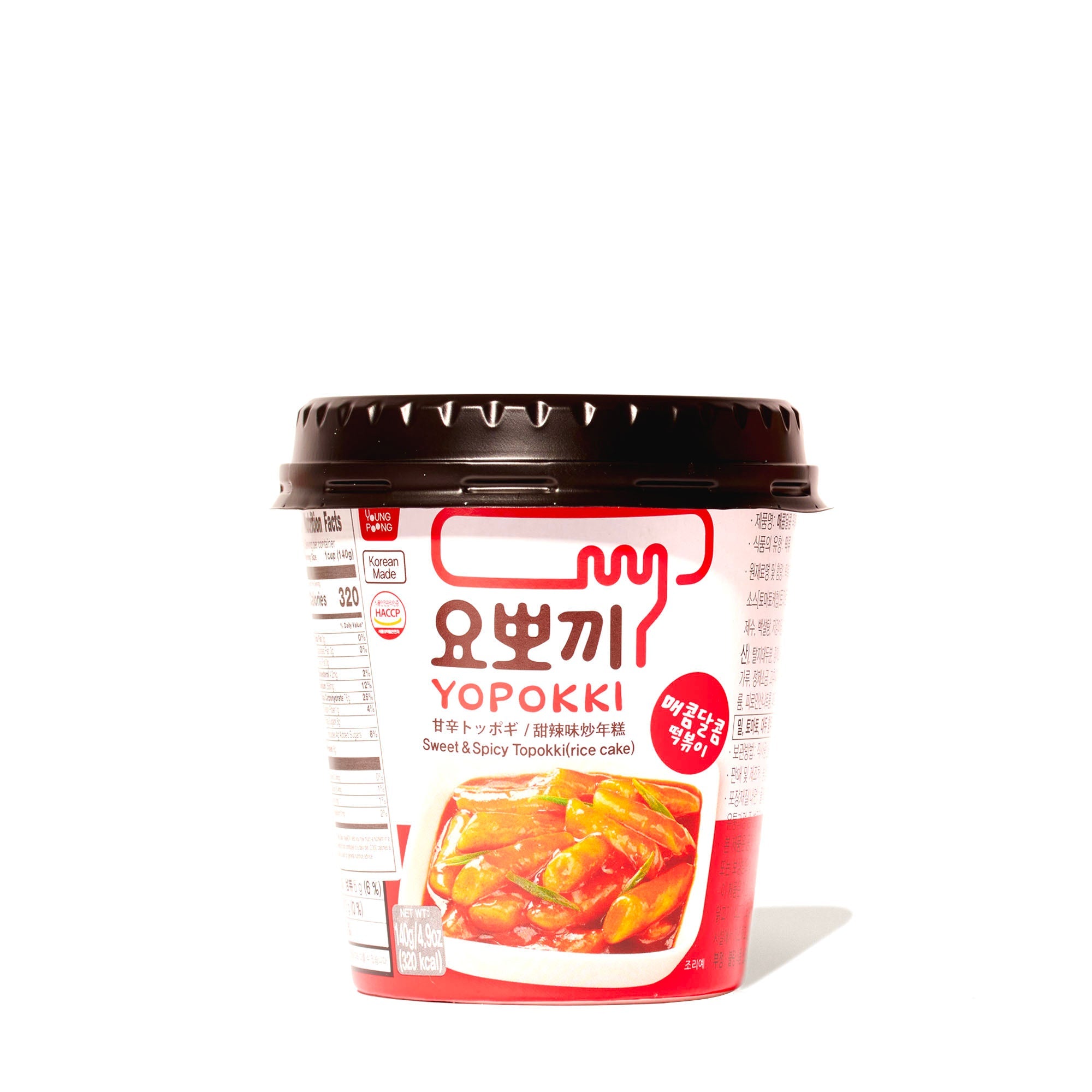 Bright pink Yopokki Sweet and Spicy Instant Tteokbokki Rice Cake Cup container