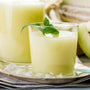 A glass of Asahi Calpico: Melon with mint leaves. thumbnail 2