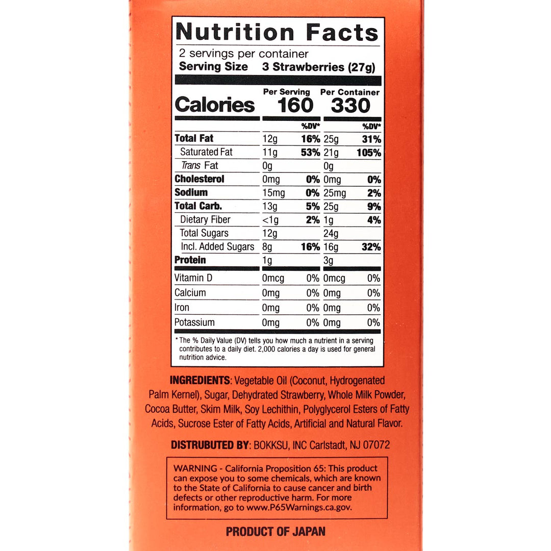 An orange nutrition label for the Bokksu White Strawberry 6-Piece Box (2-Pack) from Japan, included in the Bokksu Snack Box. The label details calorie content, fat, cholesterol, sodium, carbohydrates, protein, vitamins and other ingredients. It also features a California Proposition 65 warning.