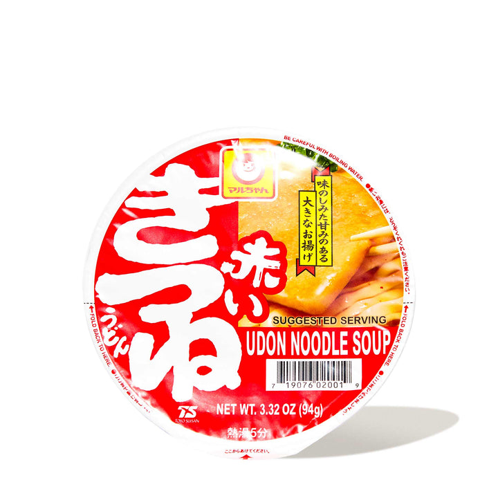 A bowl of Maruchan Akai Kitsune Udon with Fried Bean Curd with Japanese writing on it. thumbnail 1