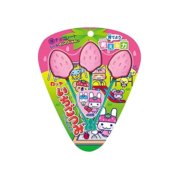 Japanese candy packaging with three pink, strawberry-shaped treats on sticks, cute cartoon characters, and Japanese text—just like the sweets you'll discover in a Conbini Treats Box.