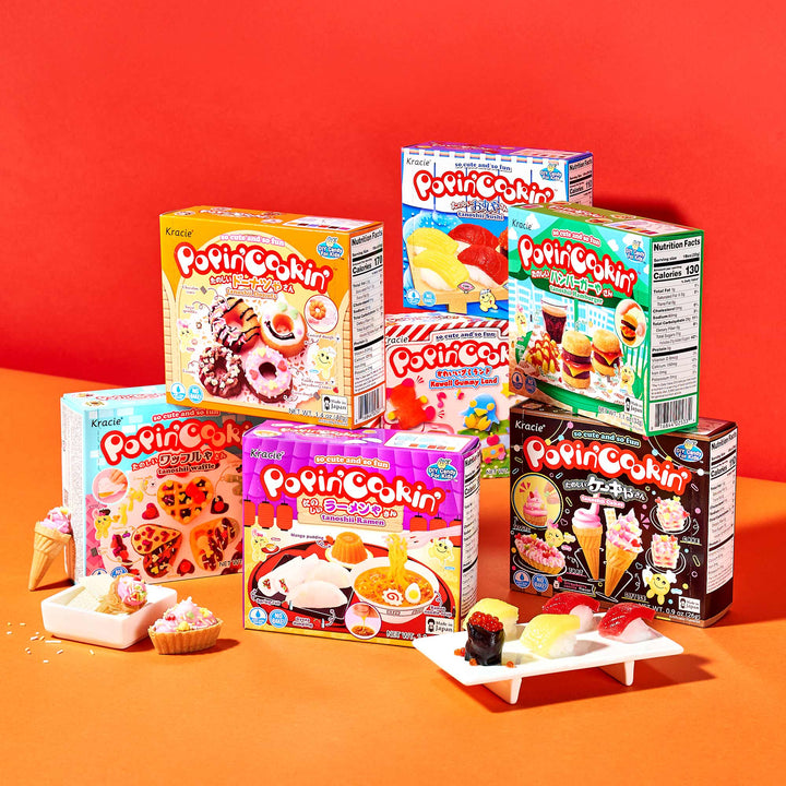 The DIY Candy Kit Pack (6-Pack) by Bokksu Market is showcased against a vibrant red background, with delightful examples of homemade candy displayed in front. thumbnail 2