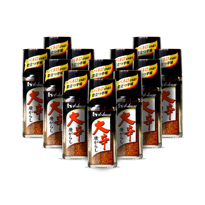 Displayed are several bottles of House Okara Togarashi Pepper with Habanero, a Japanese chili seasoning, featuring black caps and red-orange labels from the House brand& thumbnail 1