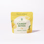 A yellow and white bag labeled "Sour Yuzu Japanese Candy Bites 0.75oz" with images of yuzu fruit and "Flavors of Japan" text highlights this citrus candy as a tasty Japanese treat. thumbnail 1