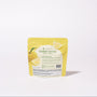 A yellow package of Sour Yuzu Japanese Candy Bites 0.75oz stands upright on a white background, with lemon slice images displayed on the packaging. thumbnail 2