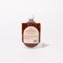 Bokksu Fiery Garlic Chili Sauce (2-Pack) comes in clear plastic pouches with screw caps and white front labels. This reddish-brown chili garlic paste is made in Japan. thumbnail 2