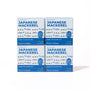 Four boxes of Bokksu Japanese Mackerel (4-Pack), featuring saba mackerel in olive oil, are labeled "Flavors of Japan" and arranged in a 2x2 stack against a white background. thumbnail 1