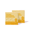Two yellow boxes of Bokksu Tinned Shirasu Anchovies with Yuzu Pepper are displayed side by side on a white background, showcasing their unique combination of shirasu anchovies and yuzu pepper flavor.