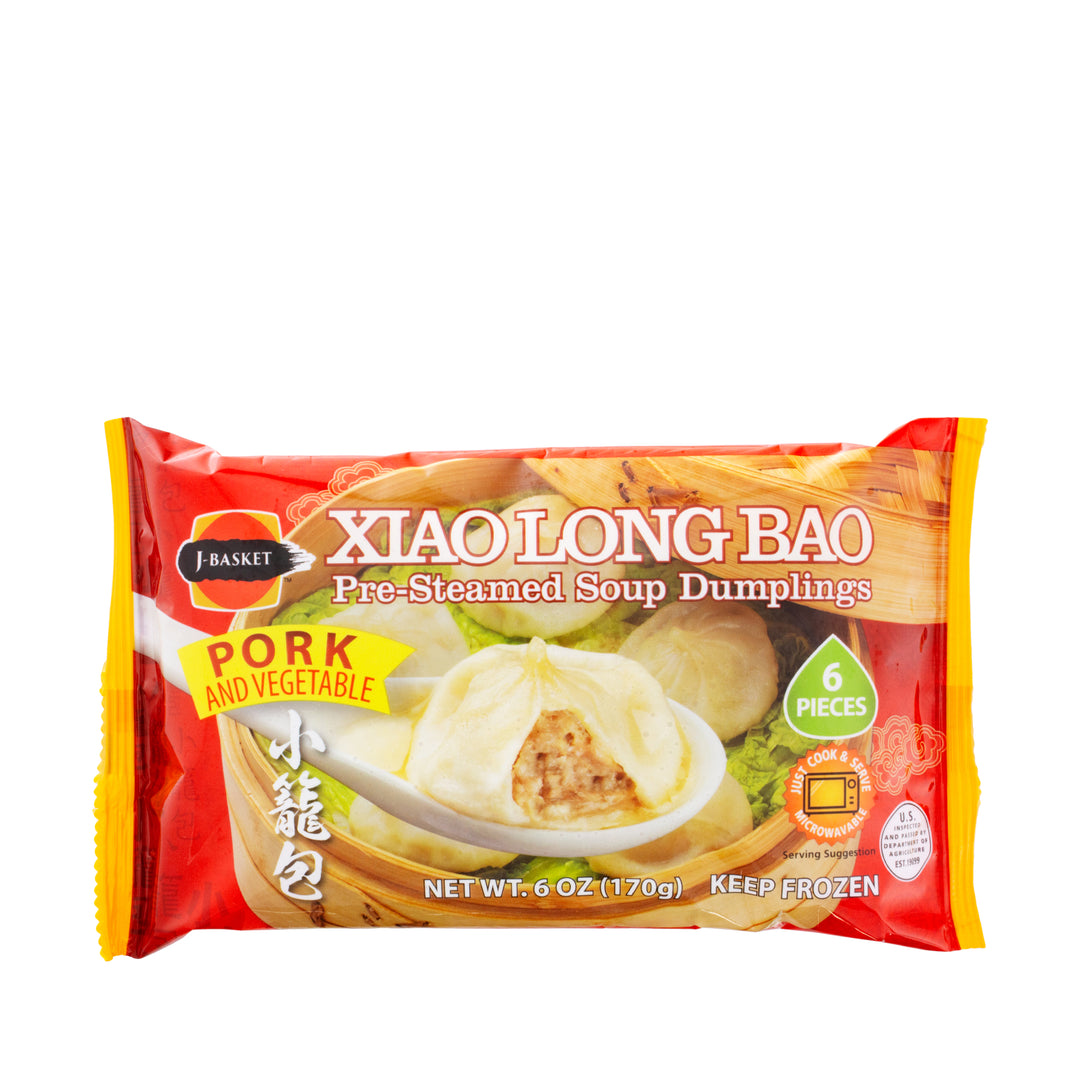 A package of J-Basket Pork Xiao Long Bao Soup Dumplings (6 pieces) with a delightful pork and vegetable filling. This traditional Chinese cuisine-inspired package is orange and yellow, contains six pieces, and weighs 6 ounces.