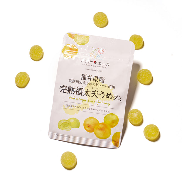 A Premium Japanese Fresh Gummy Set (Plastic Bag) is shown on a white background, surrounded by several yellow-green gummies.