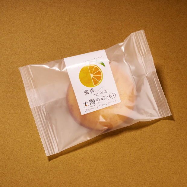 A round cookie in a clear wrapper with a white label featuring an orange slice and Japanese text, this treat is part of the April '26 Bokksu: Handpicked in Japan collection—perfect for curated Japanese snack experiences.