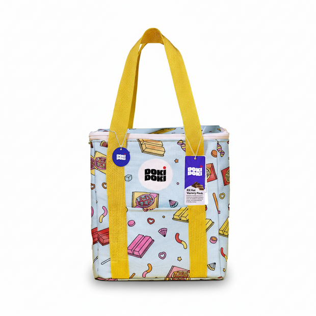 A rectangular tote bag with yellow handles, featuring a colorful snack pattern inspired by the Doki Doki Kit Kat Variety Pack (50 Pcs) and a "Doki Doki" logo tag on the front.