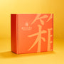 The Japanese Savory Snack Box features a bright orange design with bold stylized text and logo, displayed on a matching yellow-orange background. thumbnail 12