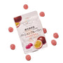 A Premium Japanese Fresh Gummy Box (Orange Box) is surrounded by round pink gummies on a white background, with packaging that displays images of fruit and Japanese text to showcase the vibrant flavors of these premium gummies. thumbnail 11