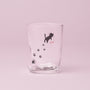 Introducing The Cat Lover’s Box: a clear drinking glass featuring a slight dent, adorned with black cat paw prints and a small black cat graphic with “cat” written in red beside it, set against a light pink background—perfect for serving your favorite cat-themed snacks or as a thoughtful addition to any Japanese cat gifts collection. thumbnail 8