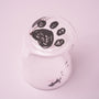 Introducing The Cat Lover’s Box: a charming white cup displayed upside down on a pink surface, adorned with a black paw print design on its bottom and tiny paw prints with a cat silhouette along its side—making it perfect for serving cat-themed snacks or as an adorable addition to any Japanese cat gifts collection. thumbnail 10