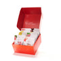 An open Premium Japanese Fresh Gummy Box (Orange Box) holds individually packaged fruit gummies, each featuring colorful fruit images and Japanese text, all neatly arranged in rows. thumbnail 1