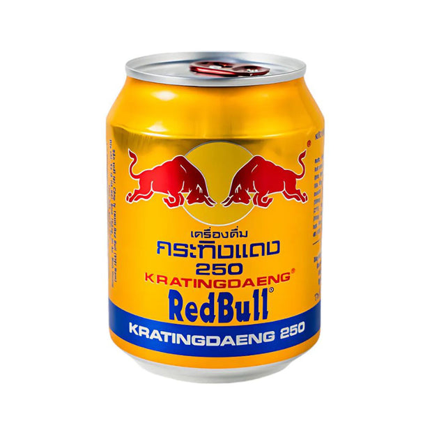 A can of Redbull Gold Energy Drink: Original, with its signature yellow and blue design and red bulls, is the perfect choice for those seeking an energy boost to enhance concentration.