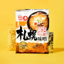 A box of The Japanese Savory Snack Box by Bokksu, featuring assorted snacks ideal for Japanese food fans, displayed against a yellow background. thumbnail 10