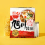 A package of soy sauce-flavored Japanese instant ramen by Bokksu is shown with its soup base packet on a yellow background—ideal for instant soup lovers or as part of The Japanese Savory Snack Box. thumbnail 11