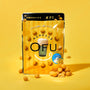 A yellow bag from The Japanese Savory Snack Box with lemon flavor is featured on a matching yellow background, surrounded by scattered round Japanese snacks. thumbnail 5