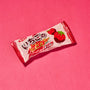 A vibrant pink-wrapped Japanese strawberry chocolate candy bar, adorned with images of strawberries and set against a matching pink backdrop, is just one of the delightful surprises you might discover in the Dagashi Snack Crate—a 30-piece Japanese snack variety box featuring an exciting assortment of candy, chocolate, cookies, mochi, and Ramune treats. Perfect for fans eager to explore unique Japanese snacks and sweets!. thumbnail 25