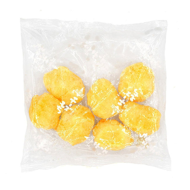 Six breaded chicken nuggets in clear, sealed plastic packaging on a white background—perfect to pair with Doki Doki Snack Mix: Japan Mochi Puffs for a delightful snack experience.